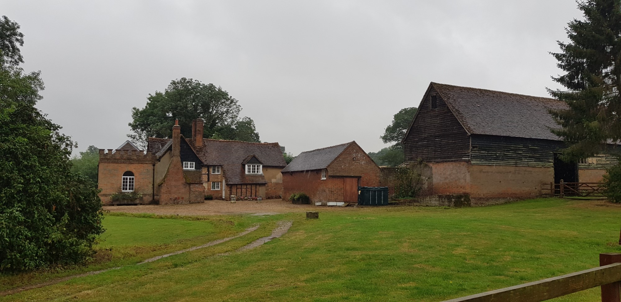 masonry building with brick facade, wooden floors and timber roof structure